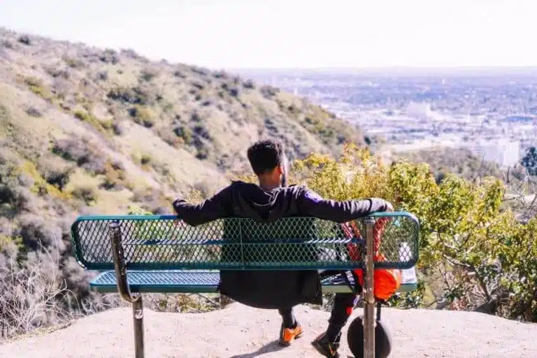 man on park bench 