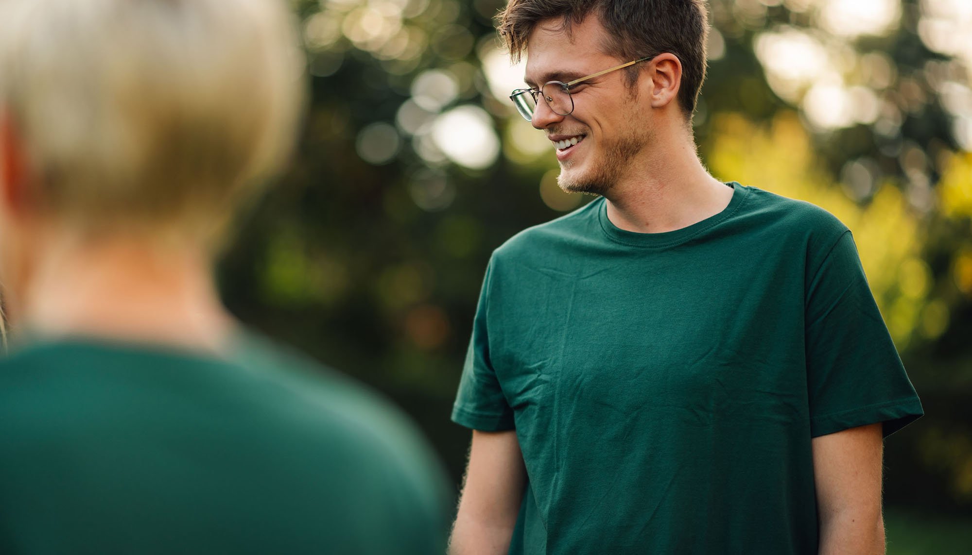 man wearing green shirt