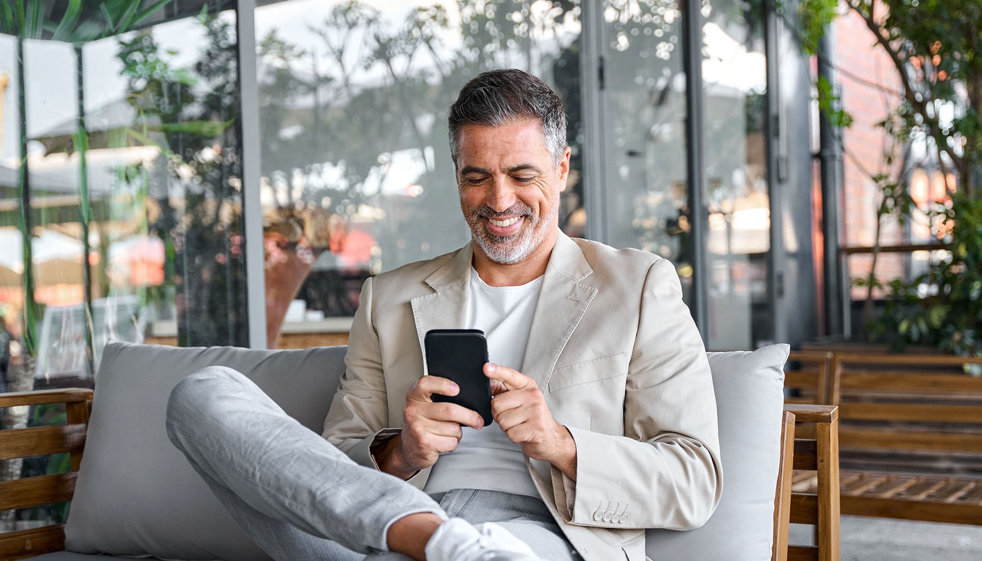 man on phone smiling