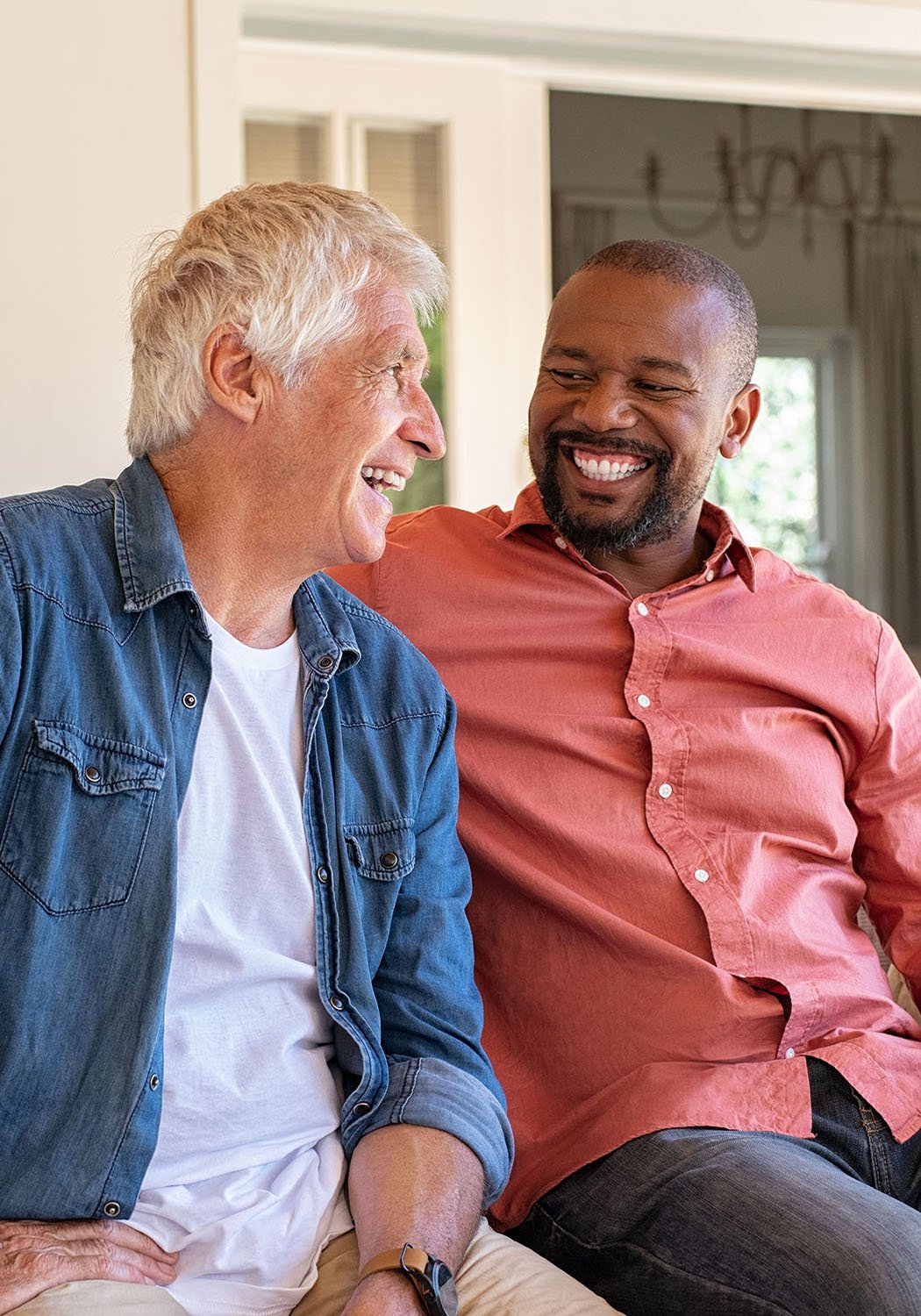 two men laughing together