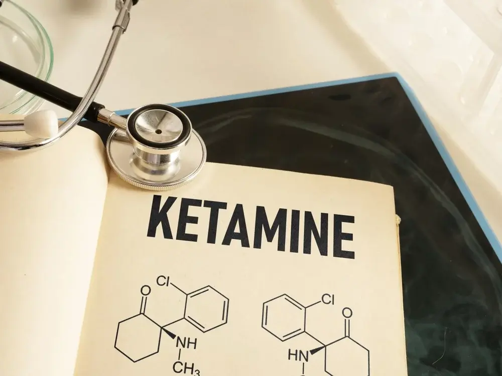 A diagram of ketamine’s molecular structure, with a stethoscope.
