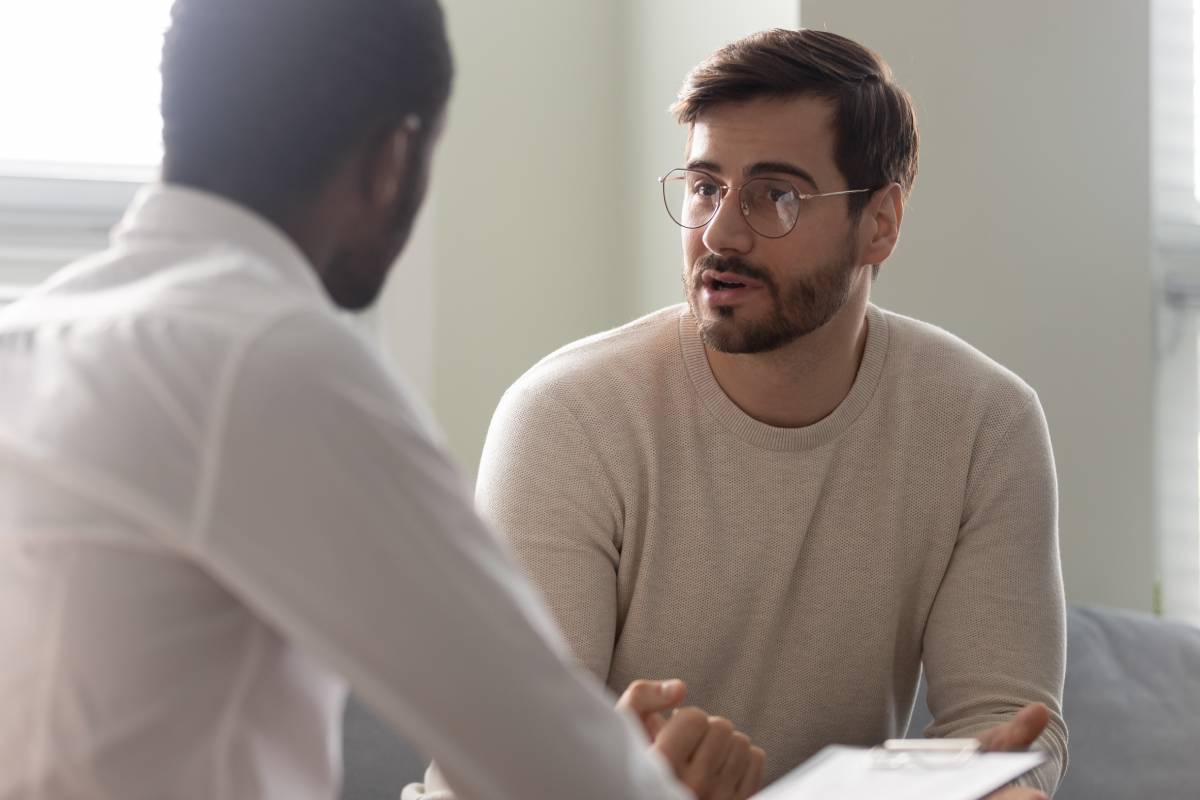 A man talking to a therapist